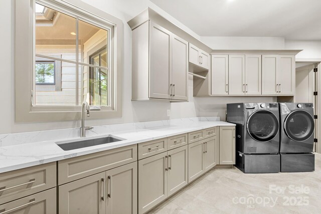 11 Nestlewood Dr Unit 310, Arden, NC 28704 - laundry area featuring washer and dryer and cabinet space