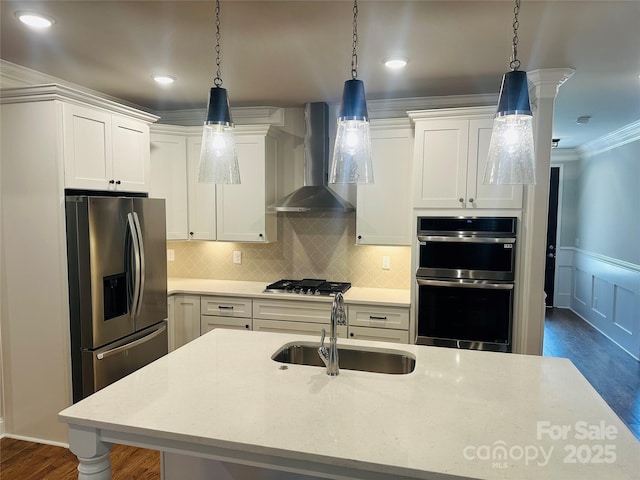 5106 Silver Trace Ln Unit 90, Denver, NC 28037 - kitchen with wall chimney range hood, a sink, appliances with stainless steel finishes, dark wood-style floors, and white cabinetry