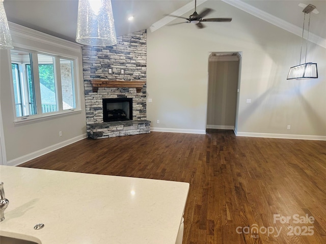 5106 Silver Trace Ln Unit 90, Denver, NC 28037 - unfurnished living room with wood finished floors, vaulted ceiling, a ceiling fan, baseboards, and crown molding