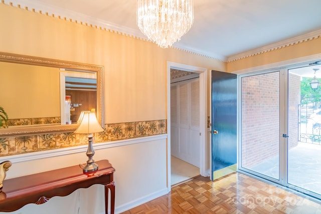 interior space featuring a chandelier and wainscoting