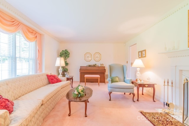 carpeted living room with ornamental molding and a fireplace