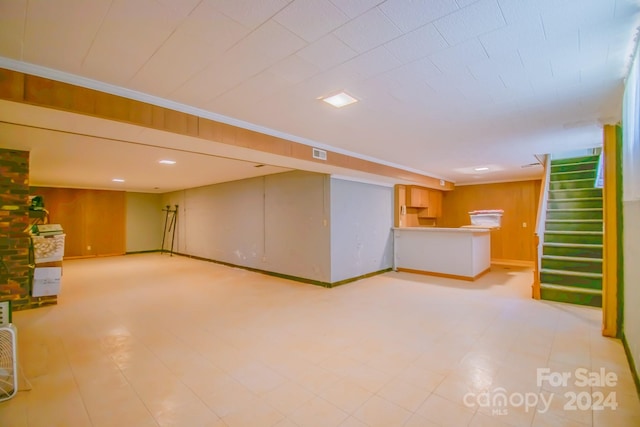 basement with light tile patterned floors