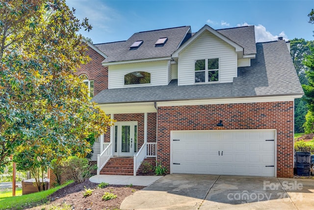 front of property with a garage