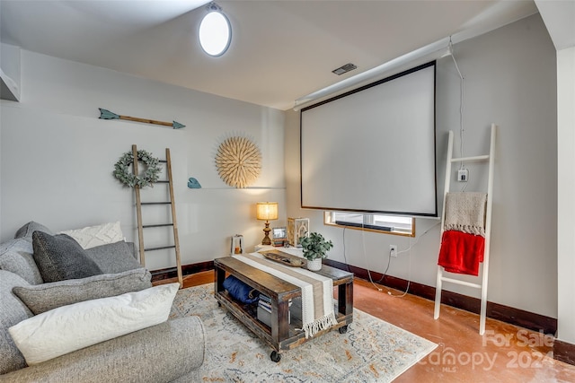 cinema room with concrete flooring