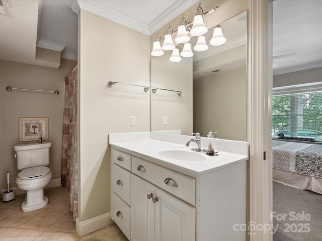 bathroom featuring tile patterned flooring, vanity, toilet, and ornamental molding