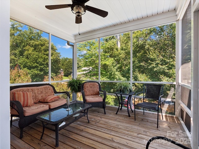 sunroom / solarium with ceiling fan and a wealth of natural light