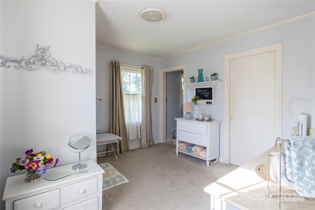 carpeted bedroom featuring ornamental molding