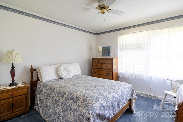 carpeted bedroom with ceiling fan