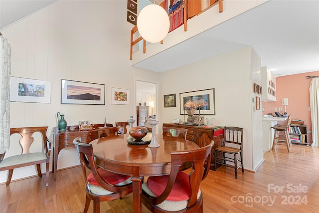 dining space featuring light hardwood / wood-style floors