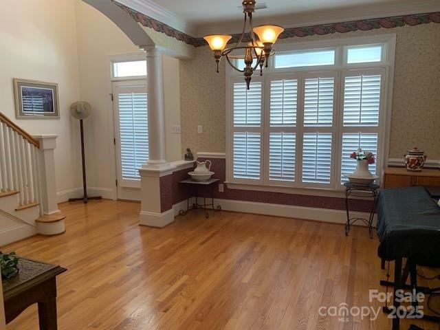 19307 Beaufain St, Cornelius, NC 28031 - office featuring arched walkways, light wood-type flooring, baseboards, and decorative columns