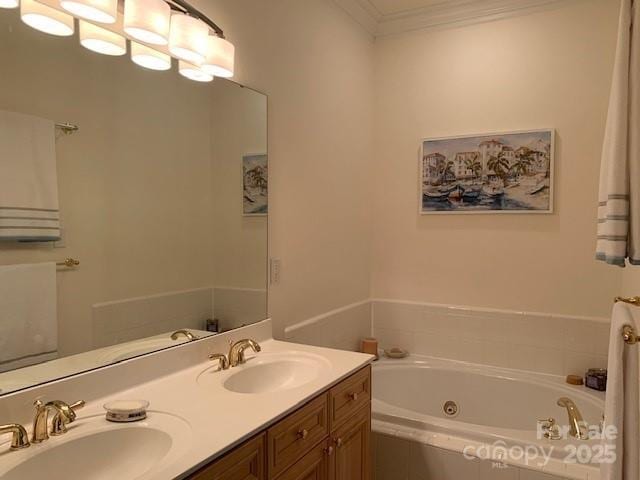 19307 Beaufain St, Cornelius, NC 28031 - bathroom featuring double vanity, a whirlpool tub, ornamental molding, and a sink