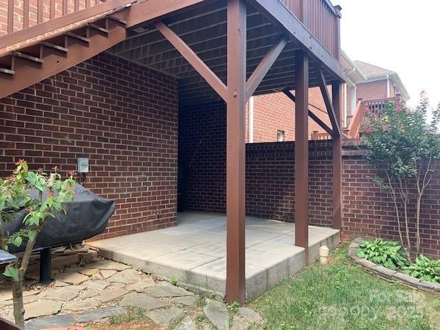 19307 Beaufain St, Cornelius, NC 28031 - view of patio / terrace featuring fence