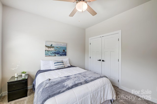 bedroom with light carpet, a closet, and ceiling fan