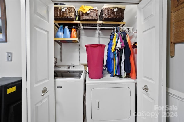 laundry room with washer and clothes dryer