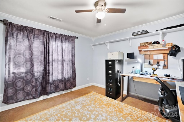 carpeted home office with ceiling fan and crown molding