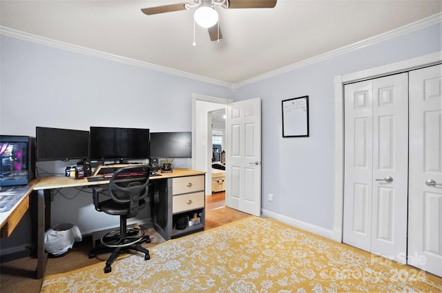 office area with ceiling fan and crown molding