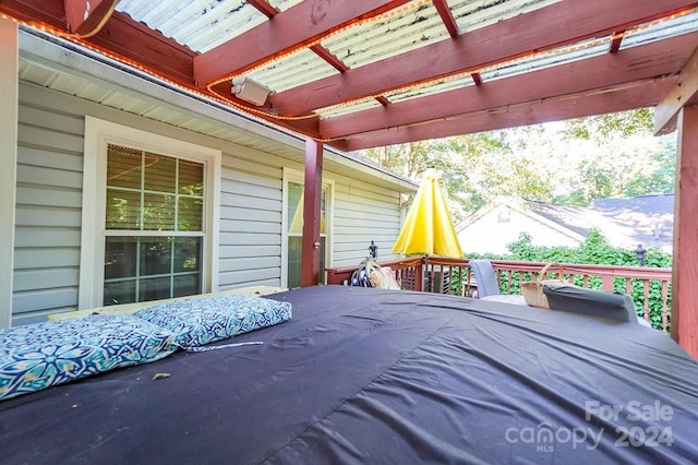 view of patio / terrace with a pergola and a deck