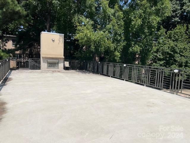 view of patio featuring fence