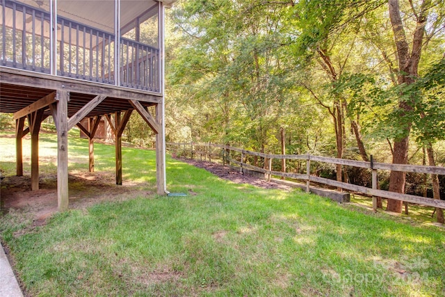 view of yard with a wooden deck