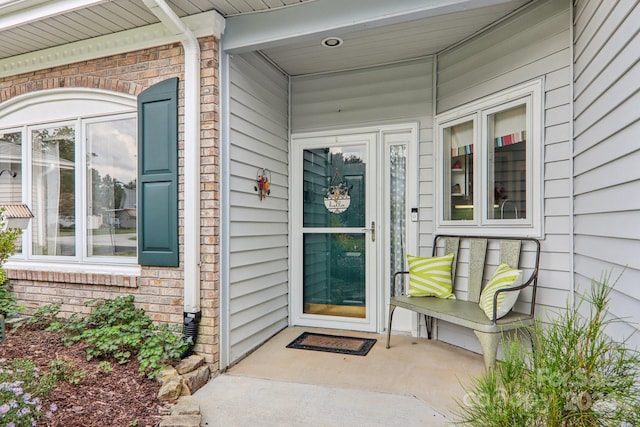 23 Country Meadows Ln, Hendersonville, NC 28792 - view of exterior entry with brick siding