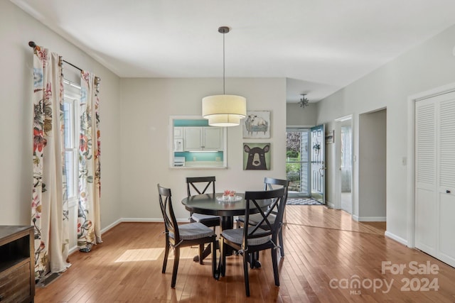 dining space featuring light hardwood / wood-style flooring