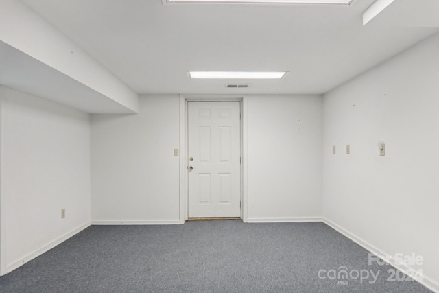 empty room with carpet flooring