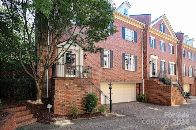 view of property exterior featuring a garage