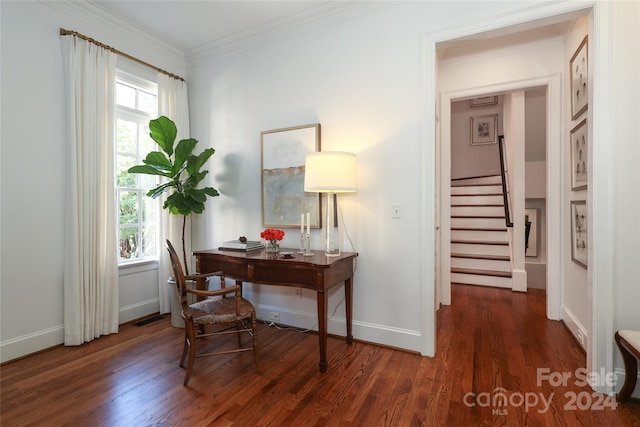 office space featuring dark wood-type flooring and ornamental molding