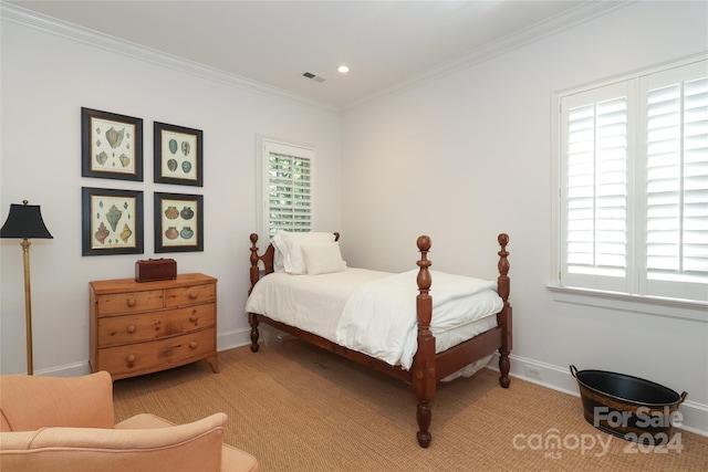 bedroom with crown molding