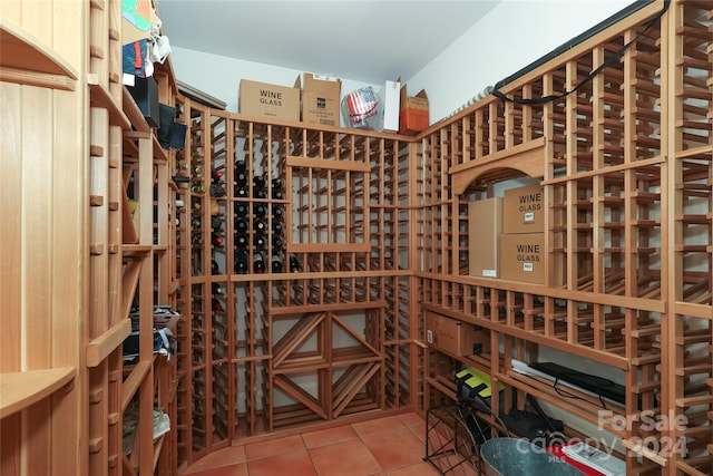 wine area with tile patterned floors