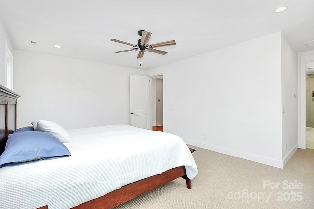 bedroom featuring light carpet and ceiling fan