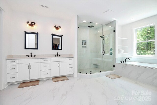6178 Chimney Bluff Rd, Lancaster, SC 29720 - full bathroom featuring a sink, visible vents, a garden tub, and a shower stall