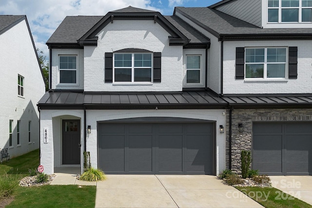 view of front of house with a garage