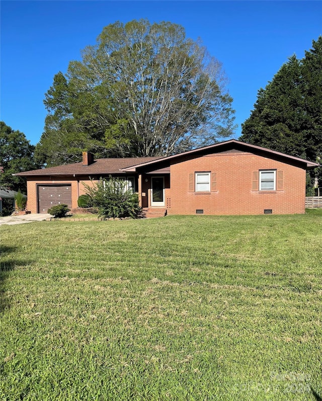 ranch-style house with a garage, a chimney, crawl space, a front lawn, and brick siding