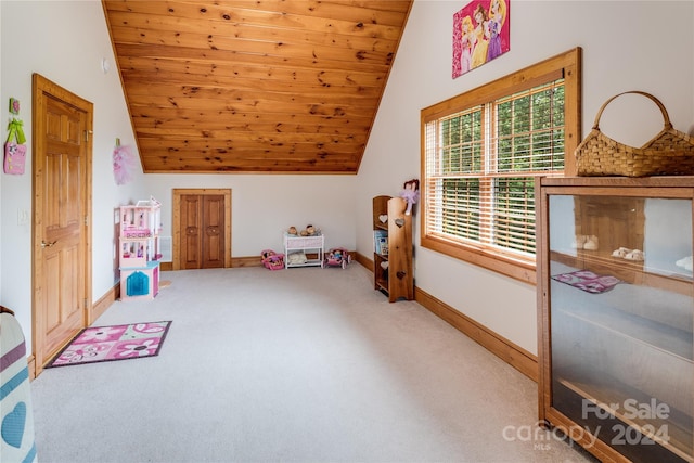 rec room featuring carpet flooring, vaulted ceiling, and wooden ceiling