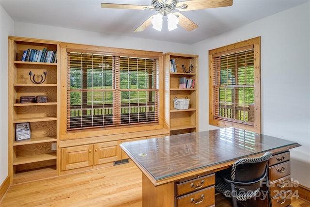 home office featuring ceiling fan and light wood-type flooring