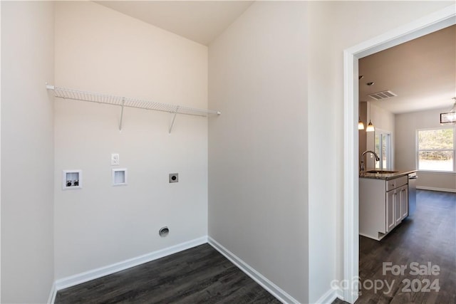 laundry area with washer hookup, dark hardwood / wood-style floors, sink, and hookup for an electric dryer