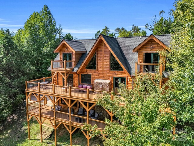 219 Highland Hts, Lake Lure, NC 28746 - rear view of house with a balcony, a shingled roof, and a wooden deck