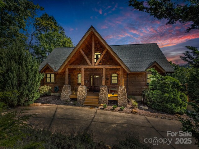 219 Highland Hts, Lake Lure, NC 28746 - view of front facade featuring a porch and a shingled roof