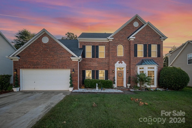 view of front property with a lawn