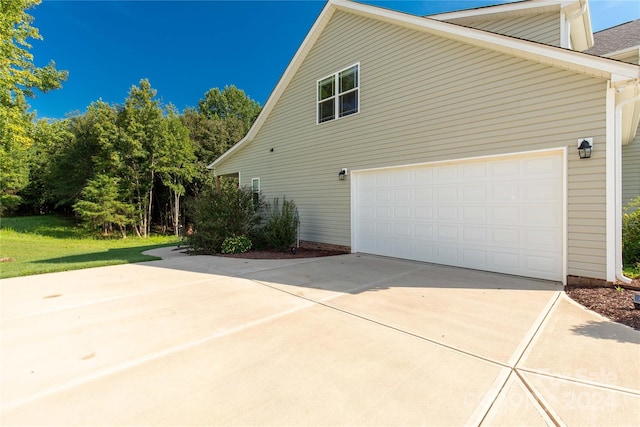 view of property exterior featuring a garage