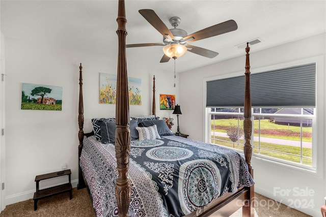 bedroom featuring ceiling fan and carpet flooring