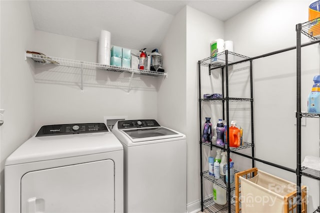 laundry area with washer and clothes dryer