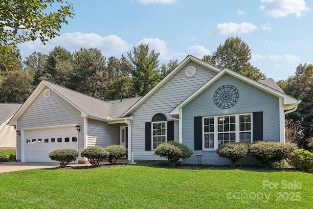 ranch-style house featuring a front yard and a garage