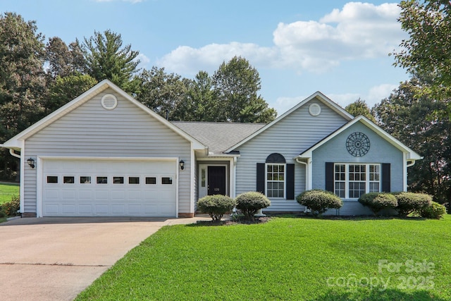 ranch-style house featuring a front yard and a garage