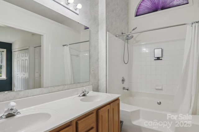 bathroom featuring vanity and shower / bath combo