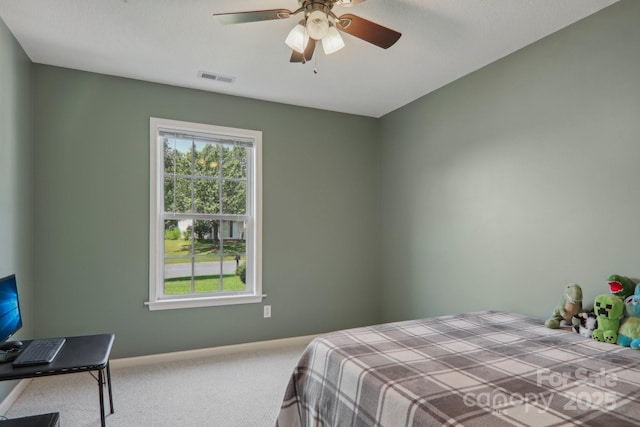 carpeted bedroom featuring ceiling fan