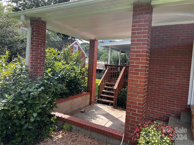 view of patio with stairway