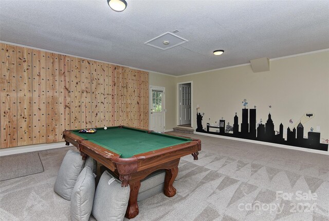 game room featuring crown molding, a textured ceiling, billiards, and carpet floors