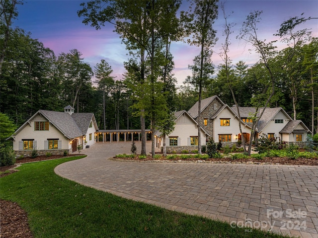 view of front of house with a lawn